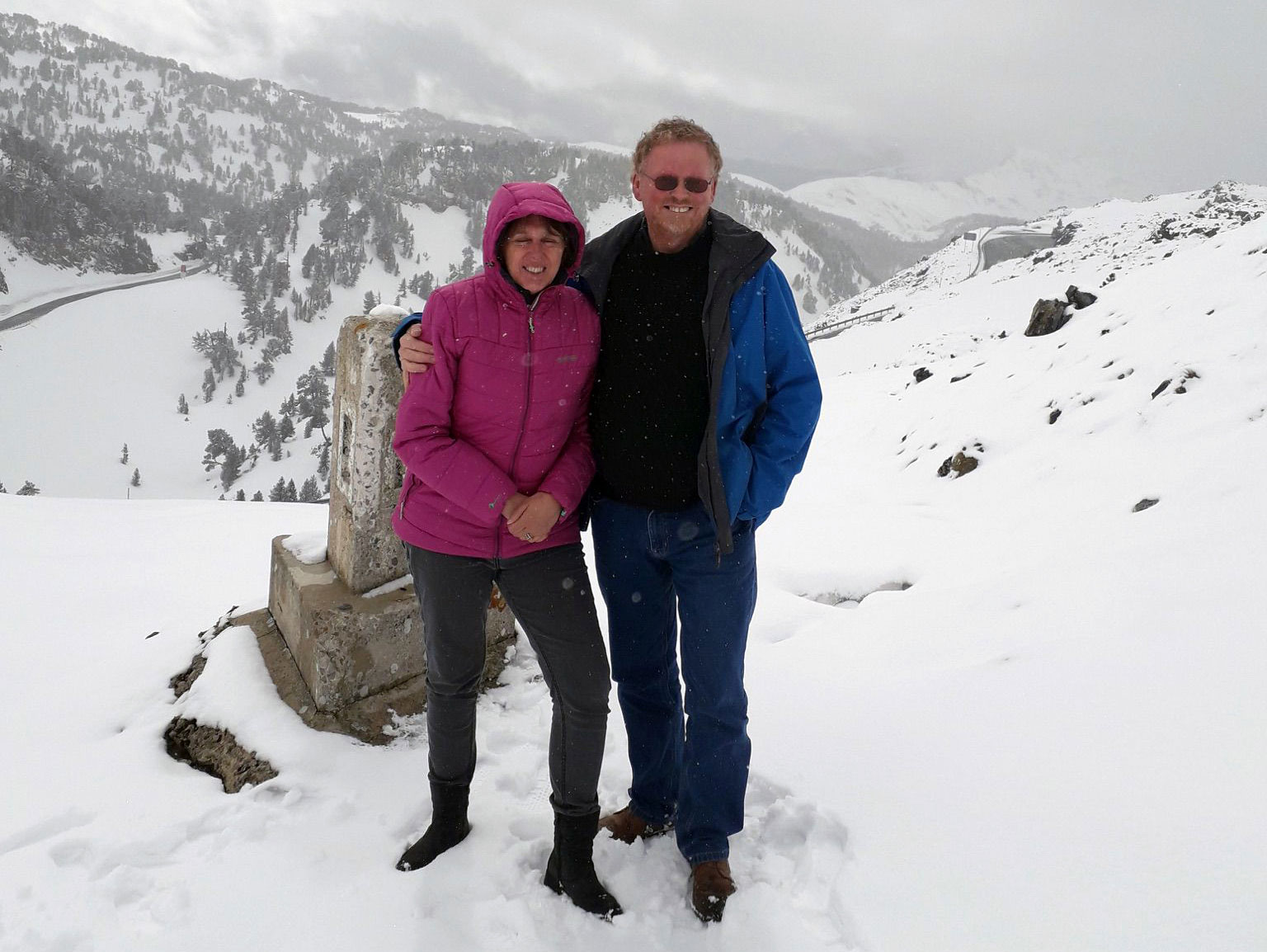 Tim and Cath in snow landscape.