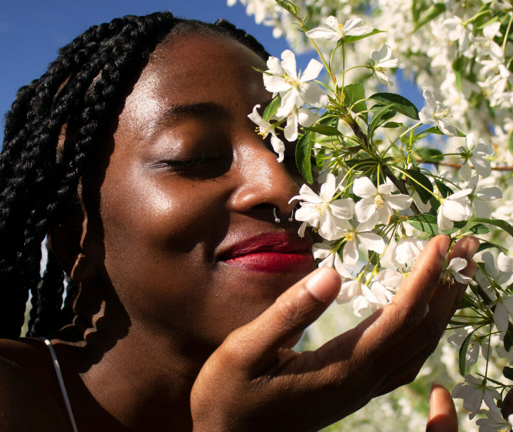 Women smelling jasmine